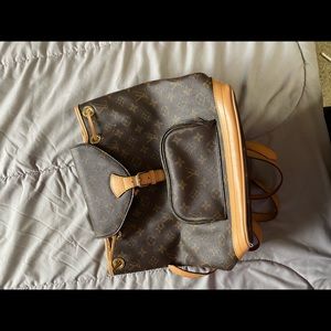Louis Vuitton backpack.